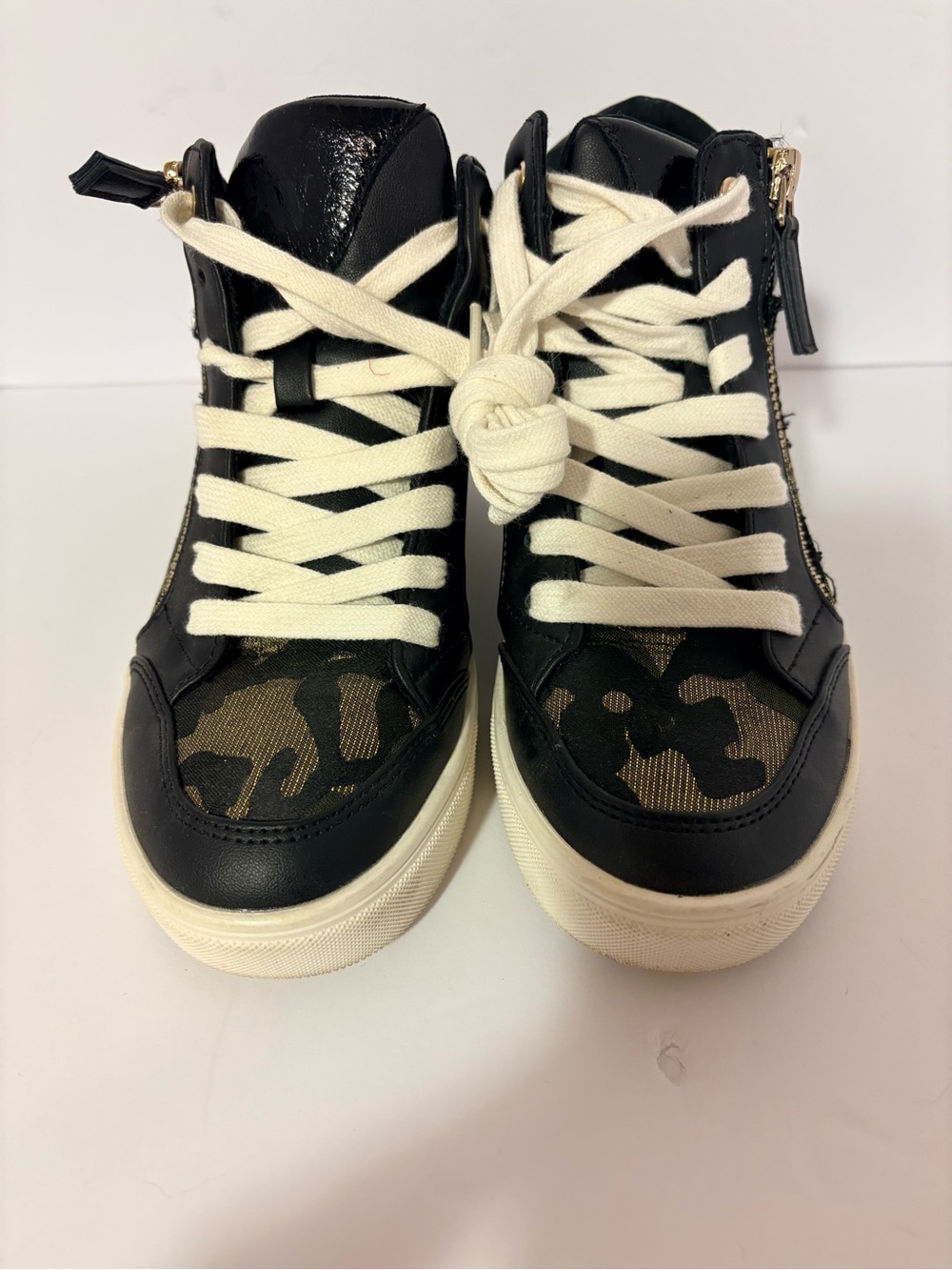 Nine West women’s Black High-Top Sneakers with Cream Laces and Camouflage Panels